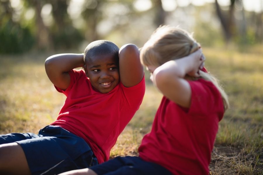 Outdoor activities - two young people exercising outside