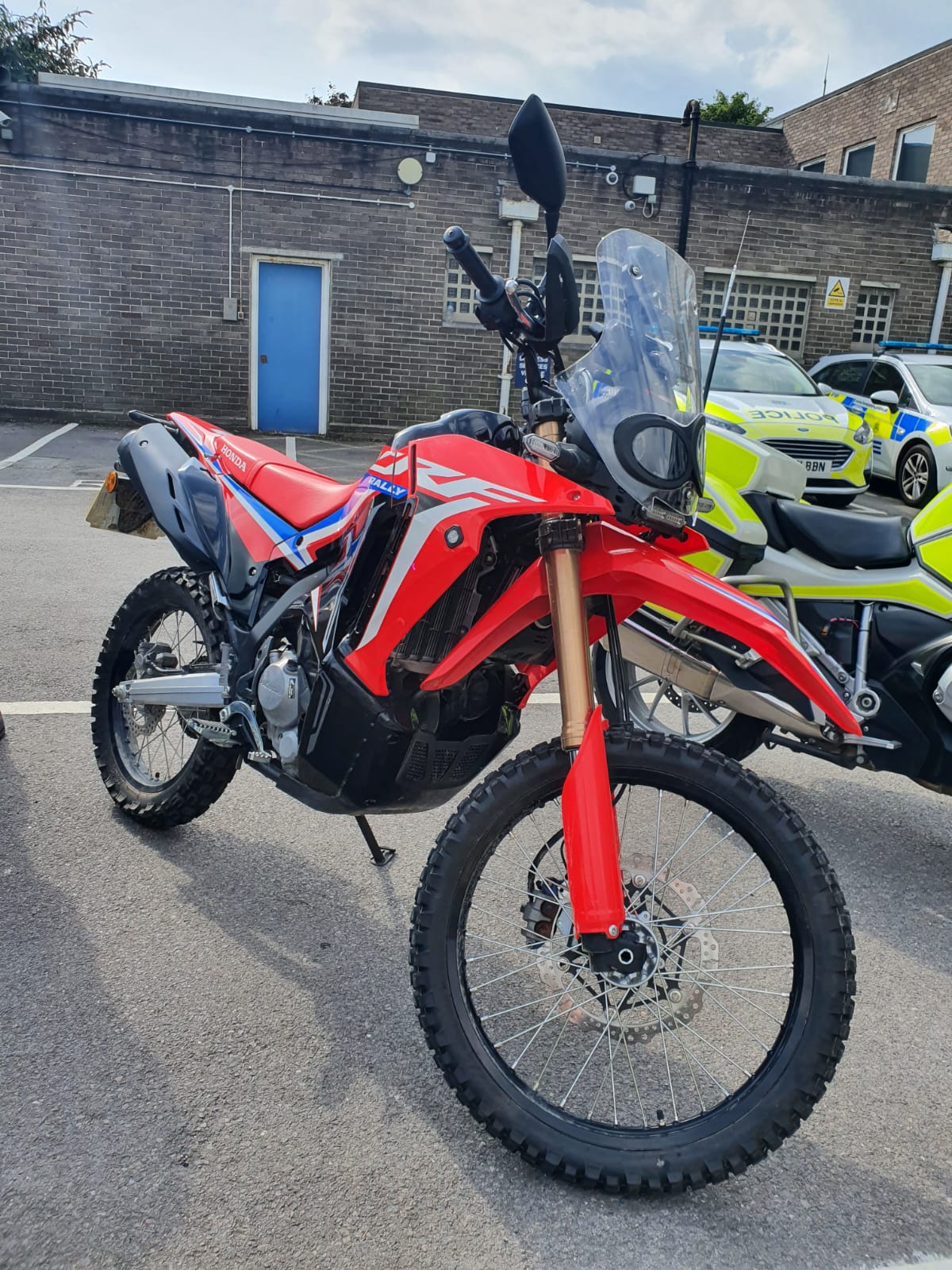 Red police dirt bike