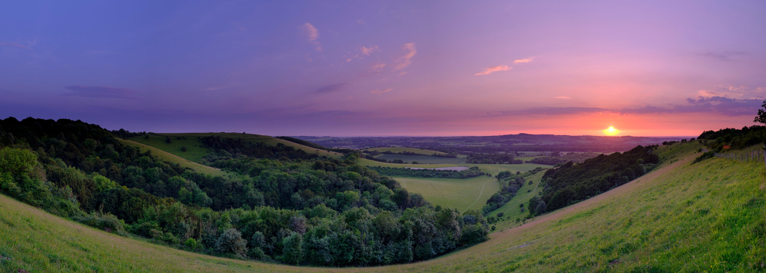 Dramatic and colourful mid-summer sunset over Beacon Hill from O