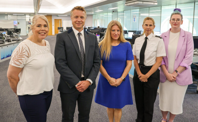 Rachel Pinnell (PCR Deputy Op's Manager), DCI Alex Spratt, PCC Donna Jones, Chief Supt Clare Knibbs, Czarina Jacobs (Stop Domestic Abuse Op's Manager) in the police control room.